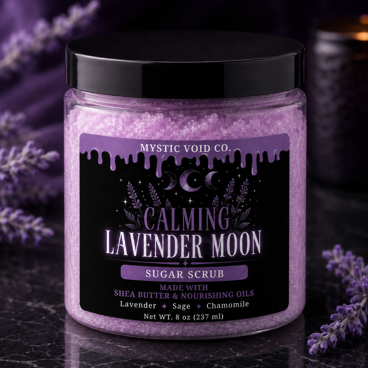 Jar of 'Calming Lavender Moon' sugar scrub with a black lid on a dark surface surrounded by lavender flowers.